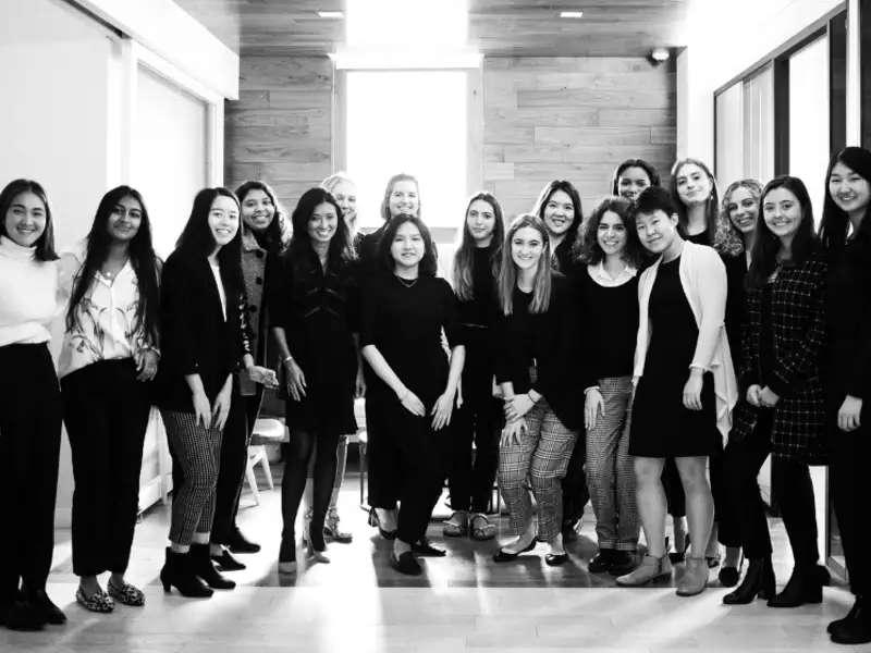 Group of Barnard students in black and white visiting Superunion